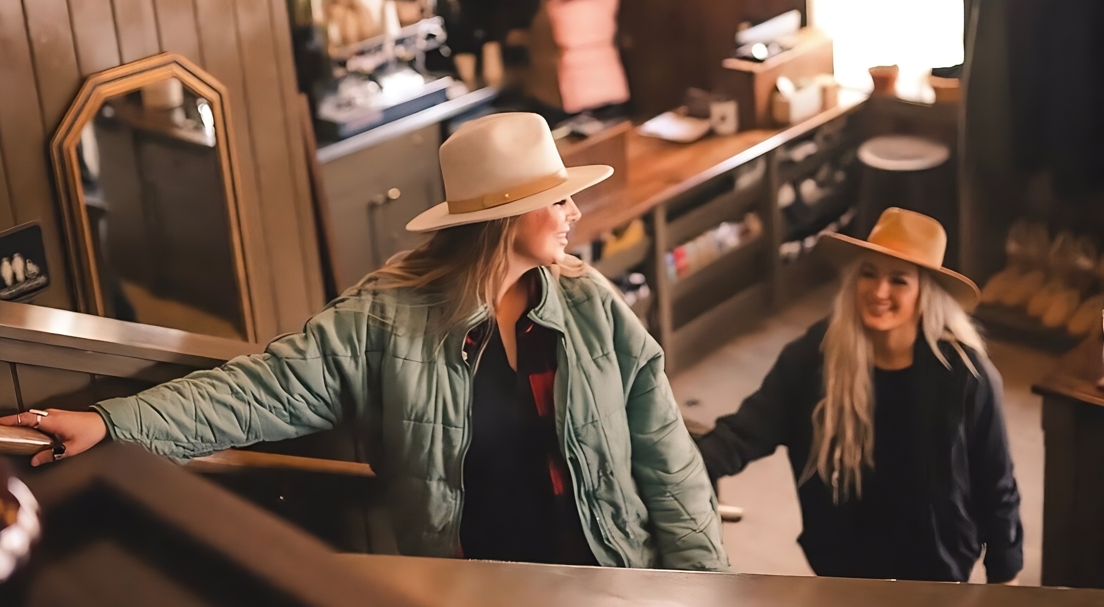 two women walking up stairs