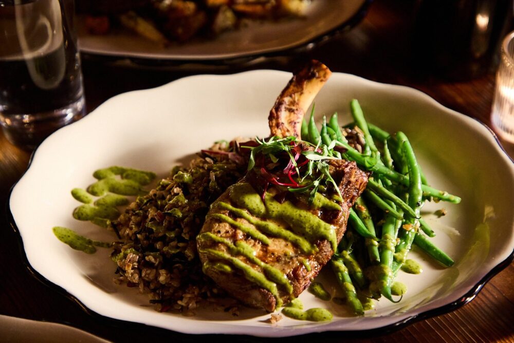 A pork chop with wild rice and green beans, from Trails End at Turpin Meadow Ranch.