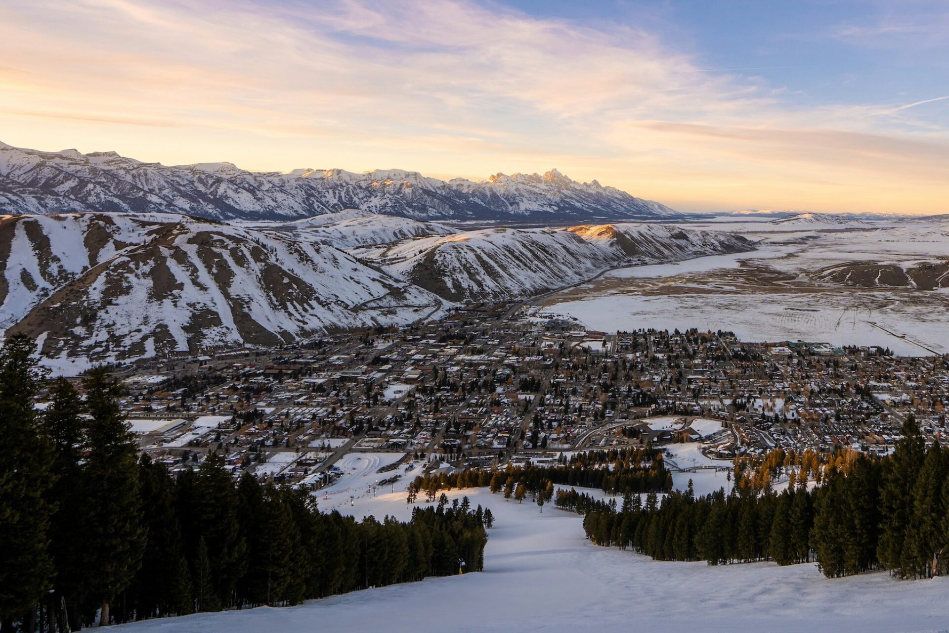 An aerial view of Jackson Hole, Wyoming, at sunset in the winter.