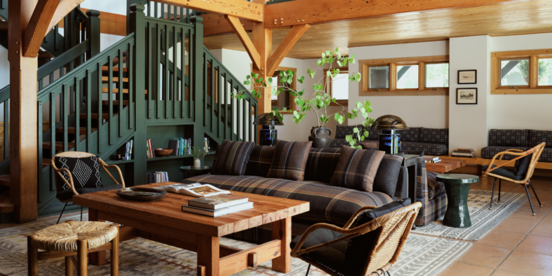 A living room with cozy chairs and books.